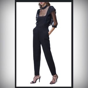 NWT jersey with lace black French Connection jumpsuit with three quarter…